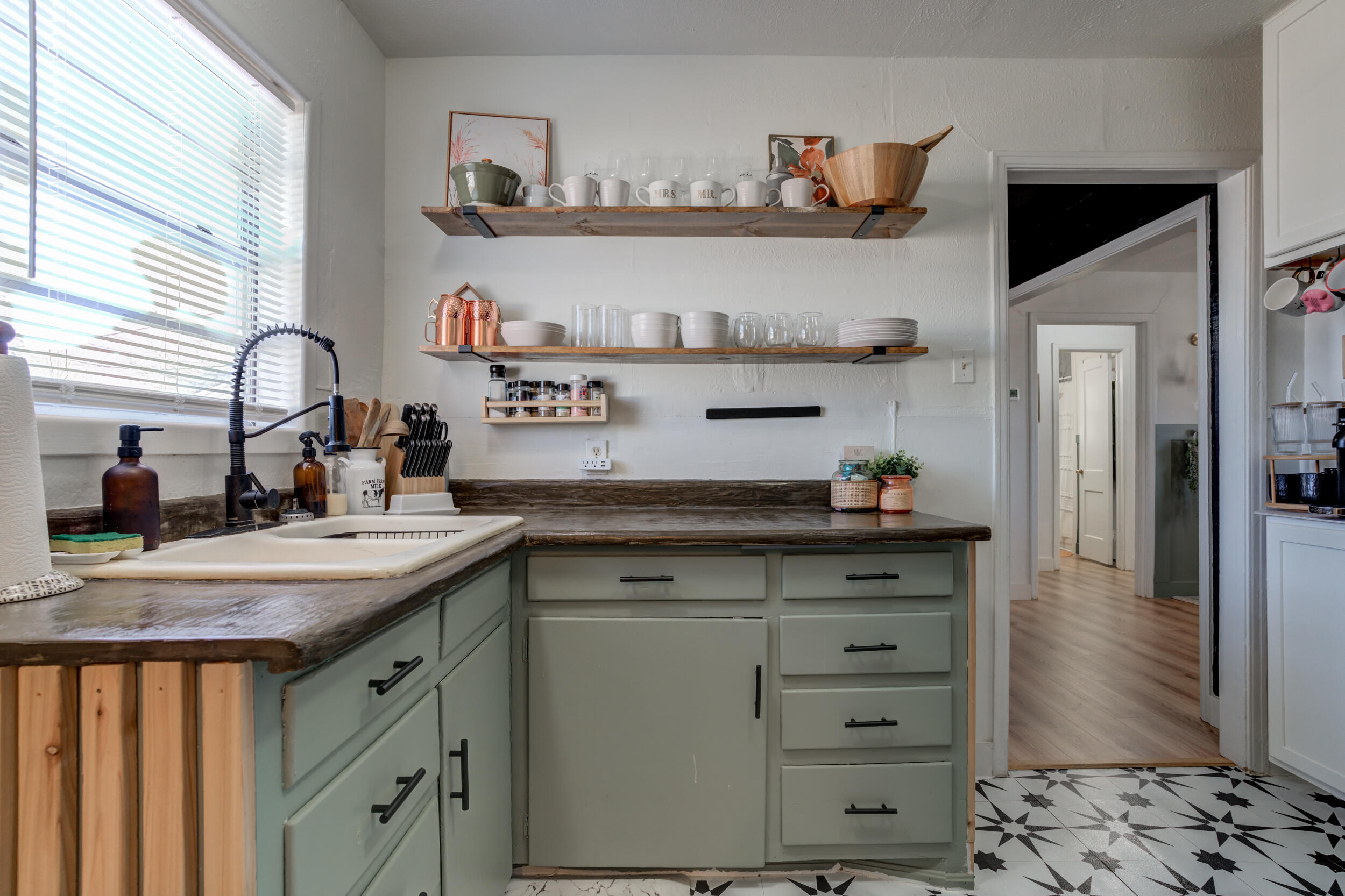 300 Aileen Street Plainview, TX 79072 - Photo 13 of 28 a kitchen with cabinets appliances and a counter space