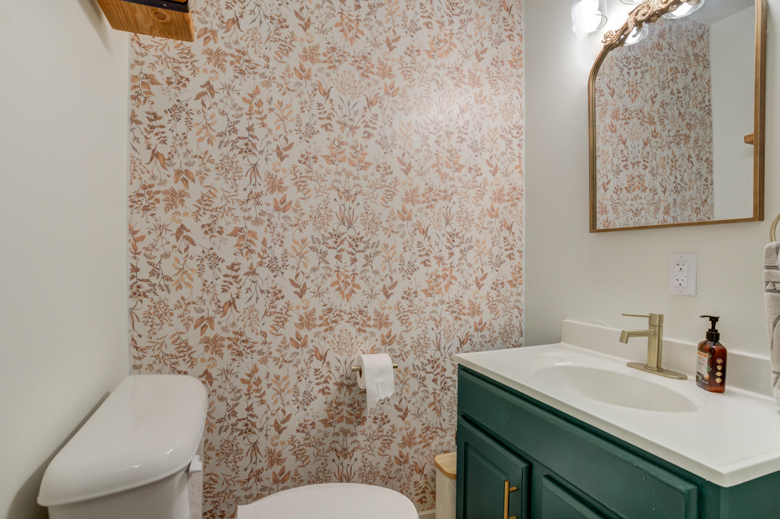 300 Aileen Street Plainview, TX 79072 - Photo 17 of 28 a bathroom with a sink and a toilet