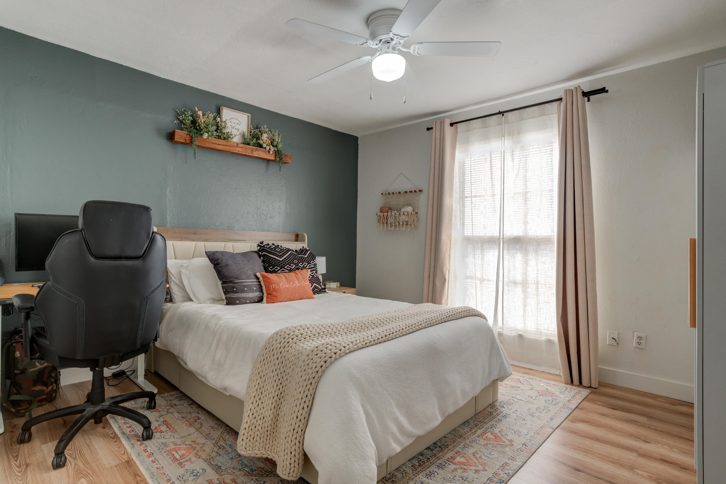 300 Aileen Street Plainview, TX 79072 - Photo 22 of 28 a bedroom with a bed and a window
