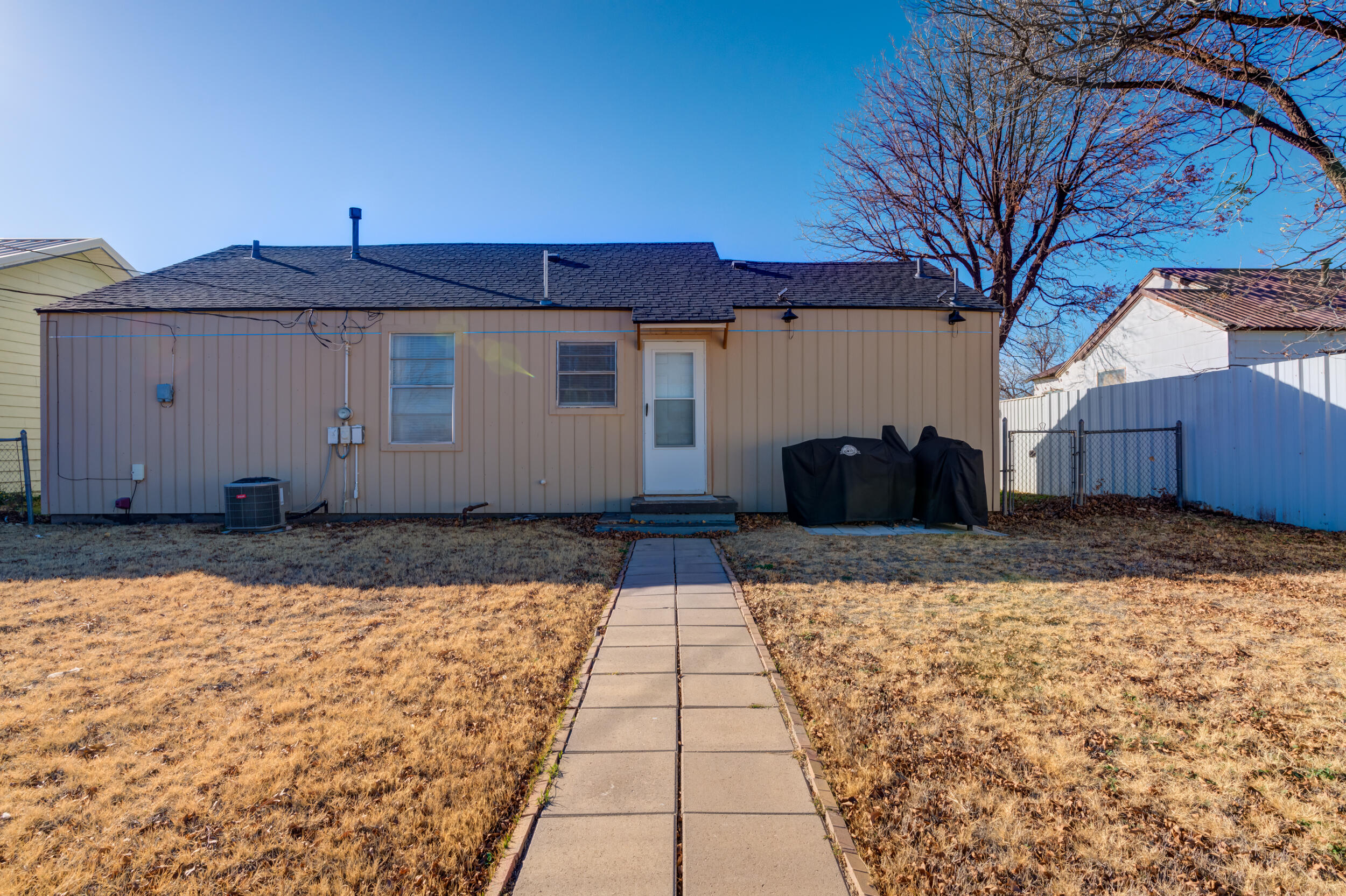 300 Aileen Street Plainview, TX 79072 - Photo 26 of 28 a front view of a house with a yard