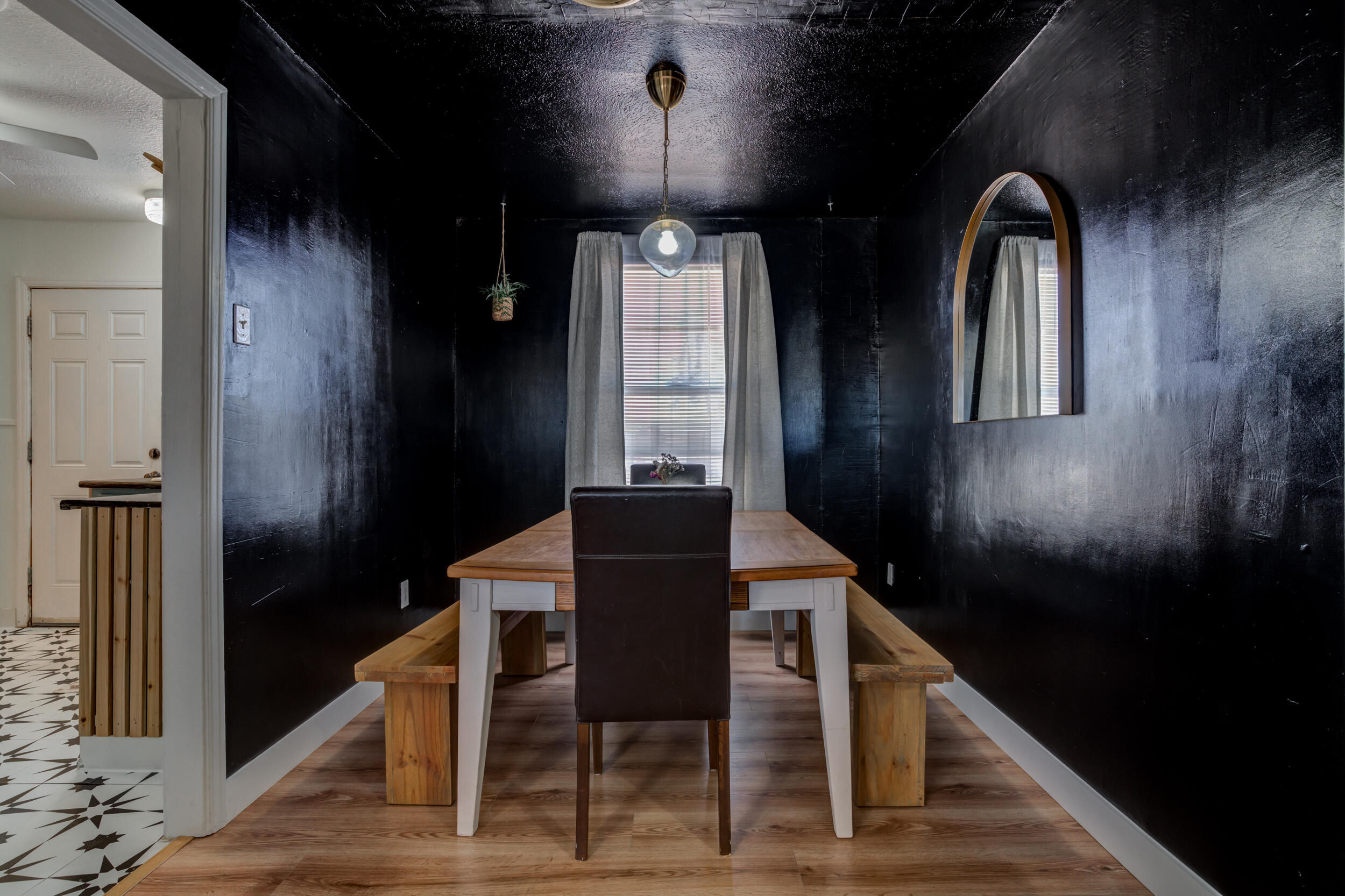 300 Aileen Street Plainview, TX 79072 - Photo 8 of 28 a dining room with furniture and wooden floor