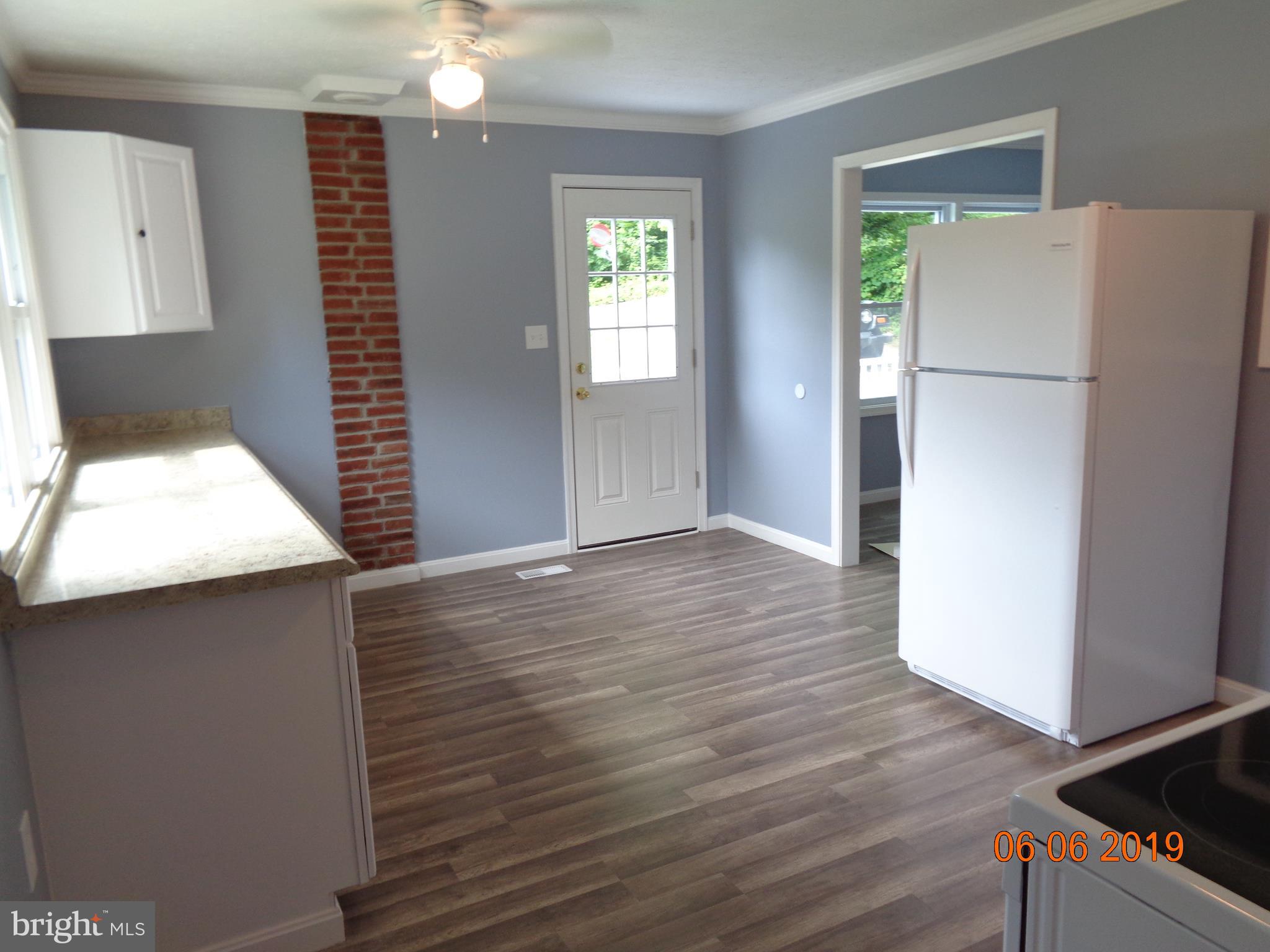 459 Mountainside Road Harpers Ferry, WV 25425 - Photo 5 of 19 KITCHEN W/ LAMINATE FLOORING