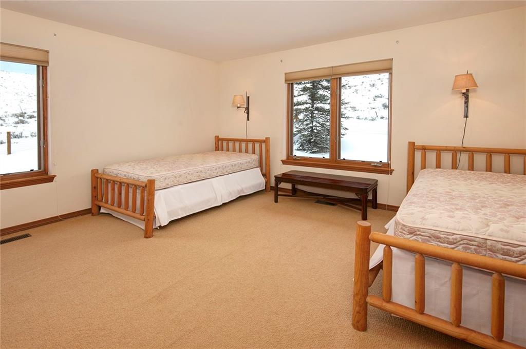 731 Pioneer Creek Road Silverthorne, CO 80498 - Photo 24 of 32 a living room with furniture and a window