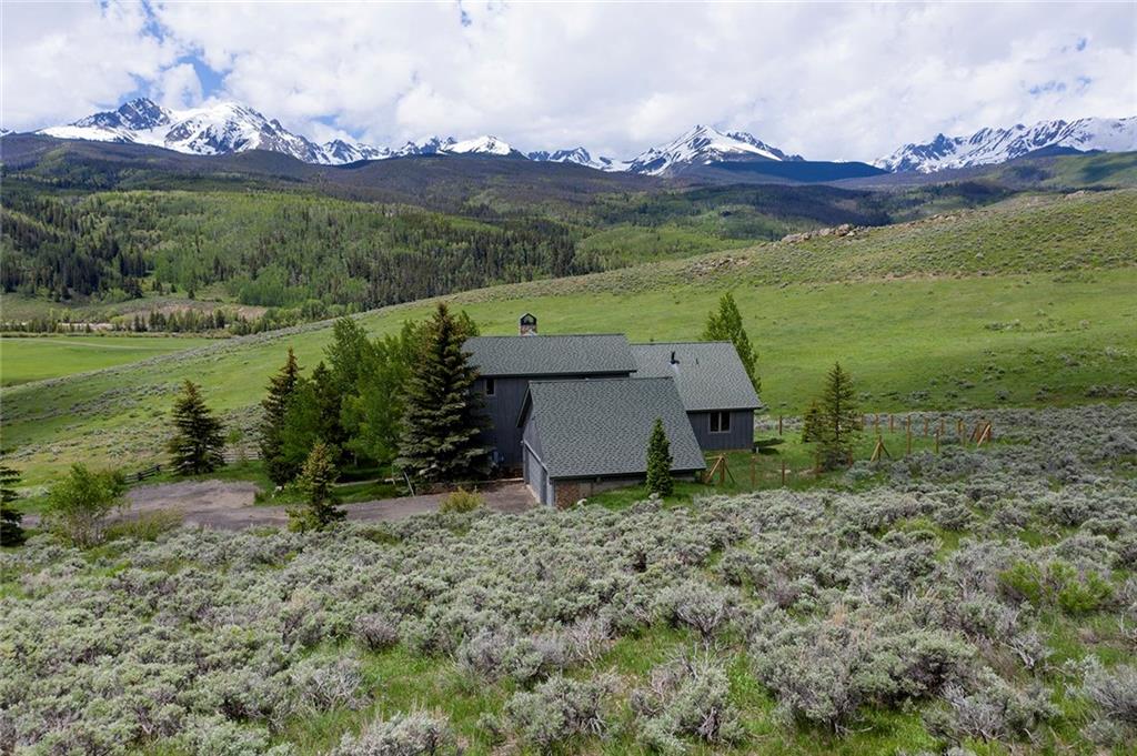 731 Pioneer Creek Road Silverthorne, CO 80498 - Photo 7 of 32 a view of lake with mountain in the background