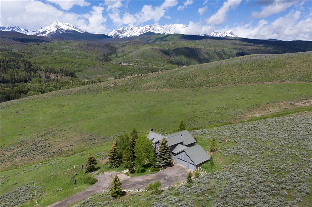 731 Pioneer Creek Road Silverthorne, CO 80498 - Photo 8 of 32 a view of a lake with a mountain in the background