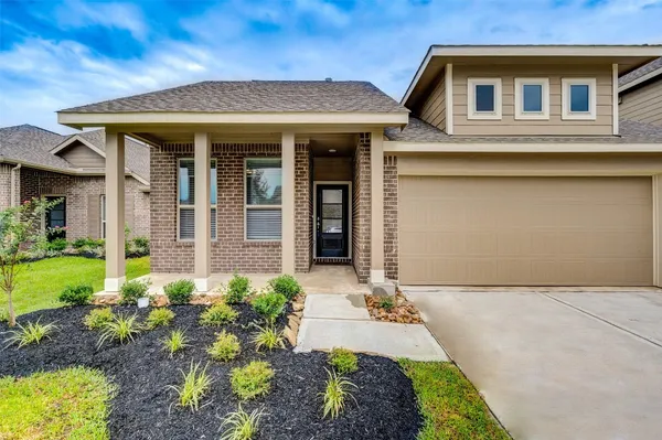 a front view of house with yard
