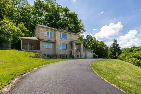 a view of a porch with a floor to ceiling window