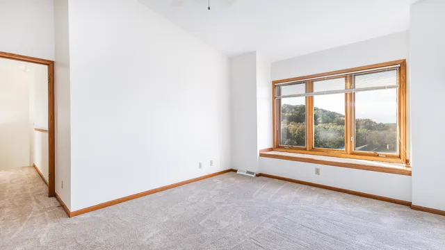 an empty room with window