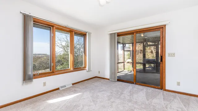 an empty room with windows