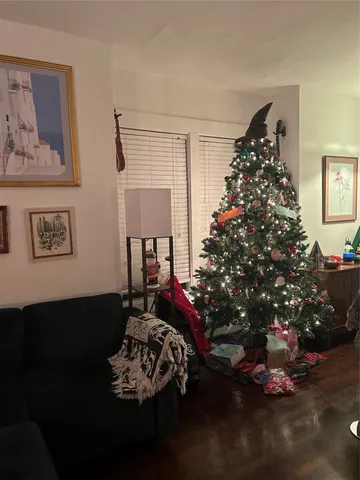 a bedroom with bed and a window