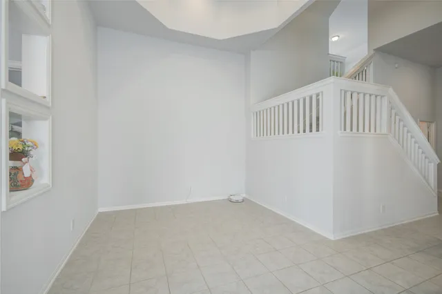 a view of an entryway with white walls