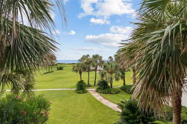 a bathroom with a bathtub and a window
