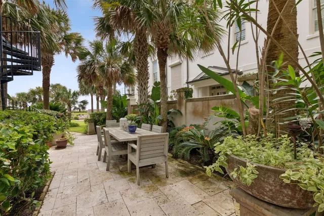 a view of a house with a garden