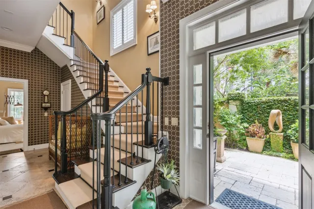a living room with furniture fireplace and a flat screen tv