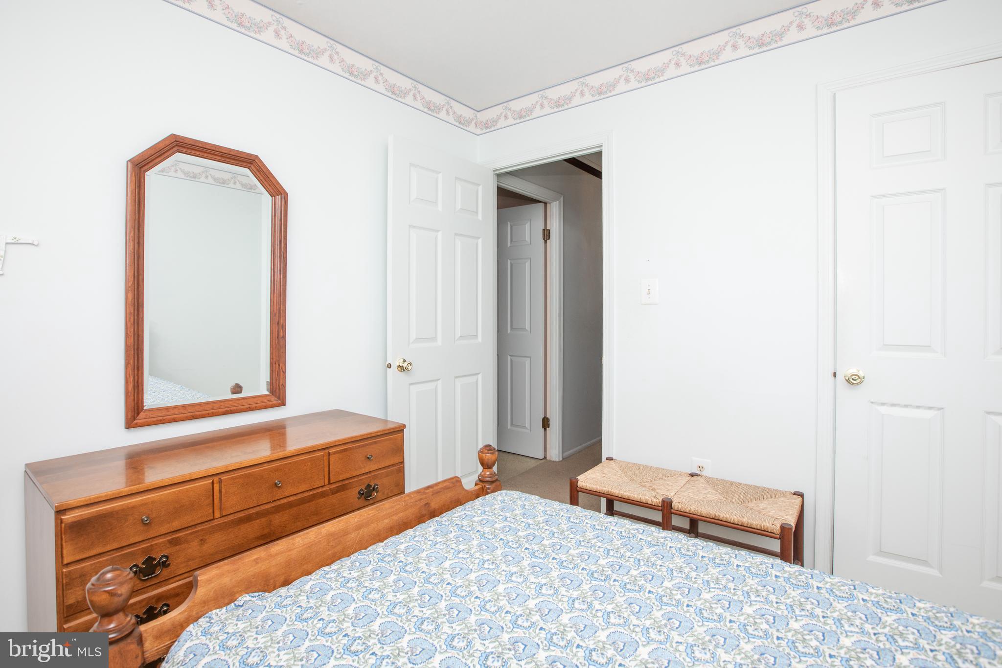 34 Kelly Court Hamilton, NJ 08690 - Photo 16 of 31 a bedroom with a bed and a dresser