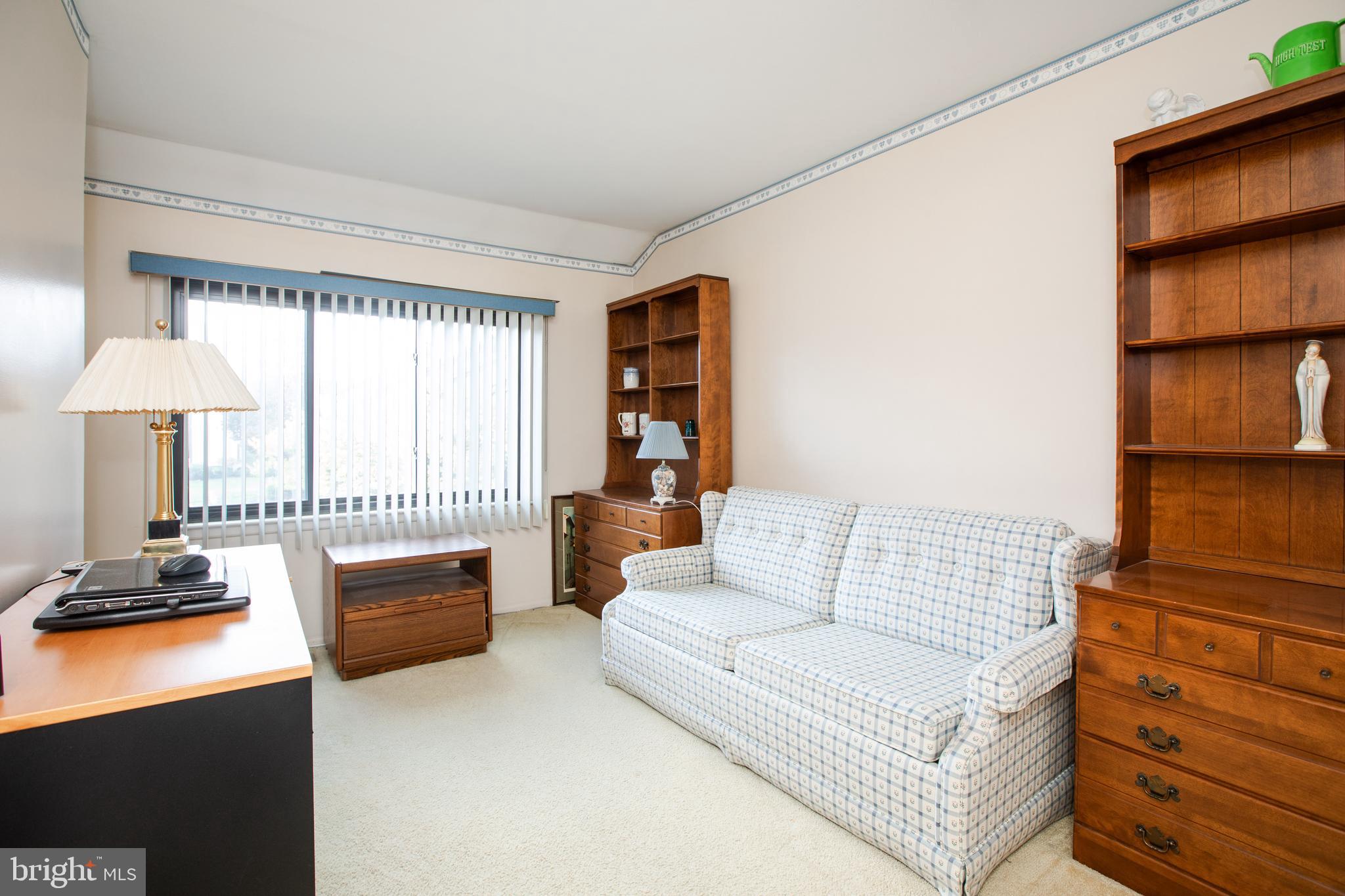 34 Kelly Court Hamilton, NJ 08690 - Photo 17 of 31 a living room with furniture and a window
