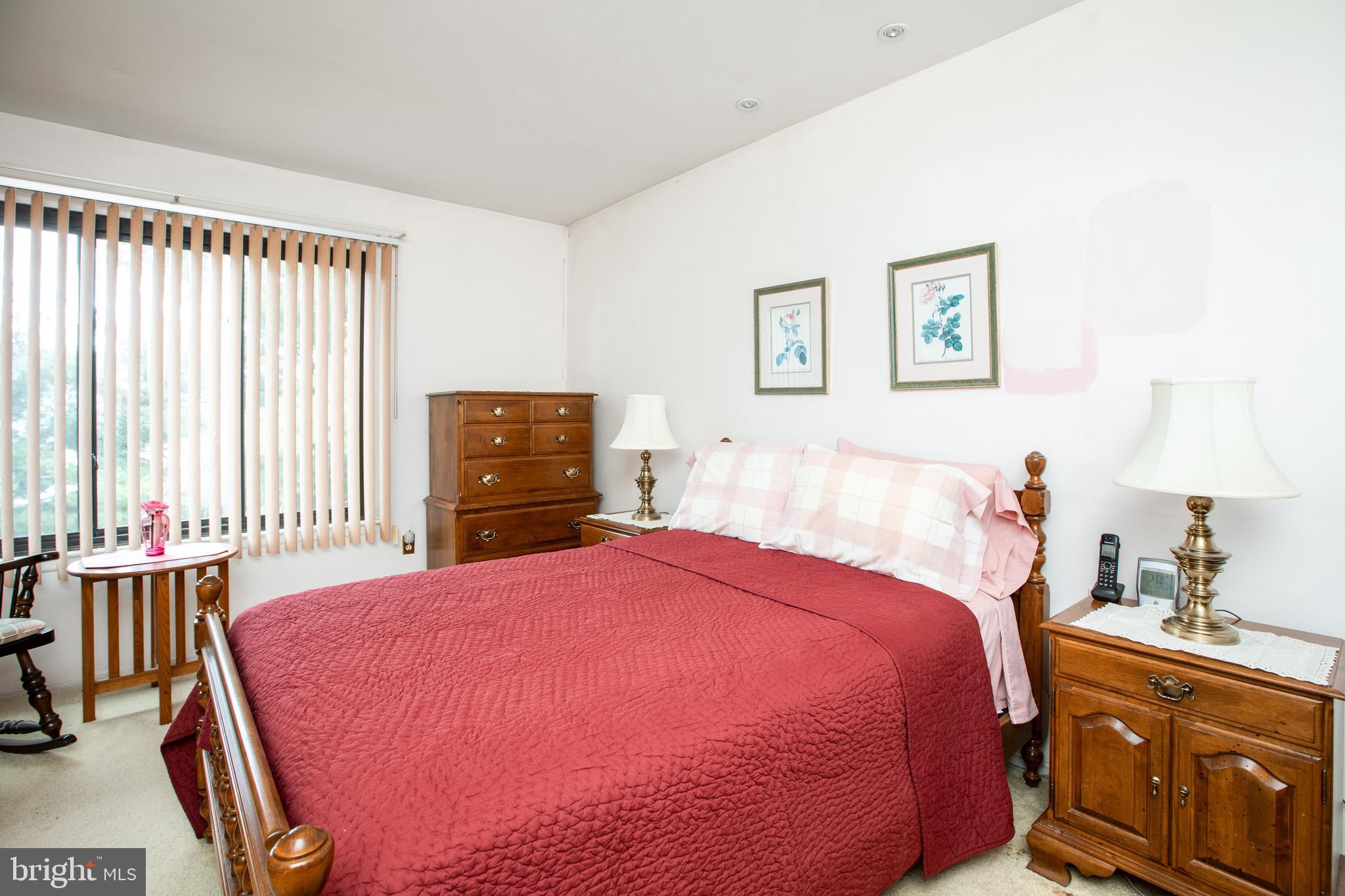 34 Kelly Court Hamilton, NJ 08690 - Photo 22 of 31 a bed room with a bed and a tv