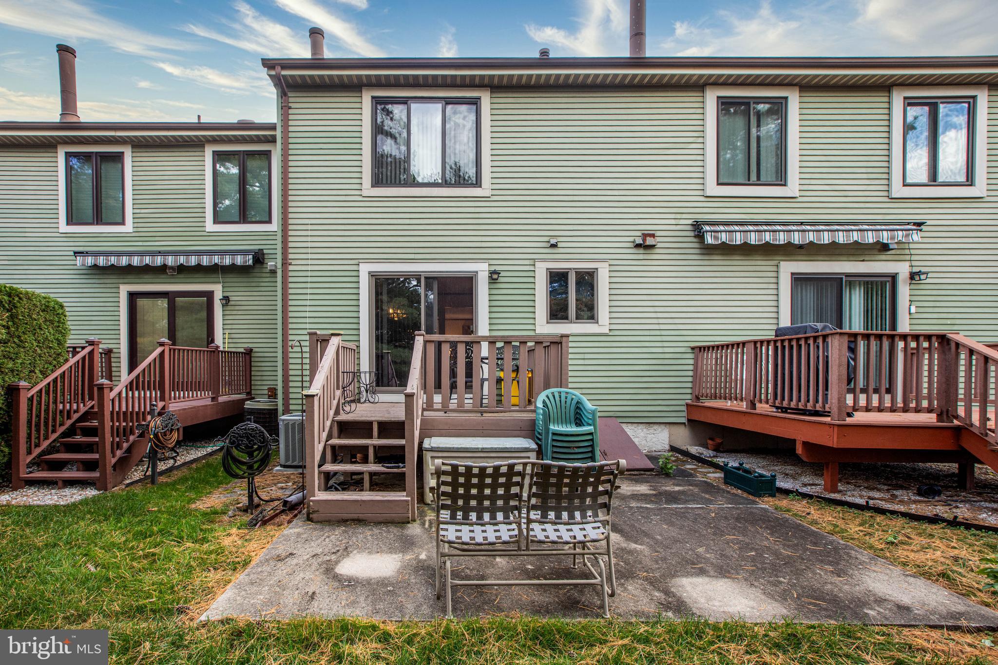 34 Kelly Court Hamilton, NJ 08690 - Photo 26 of 31 a view of a house with a deck and furniture