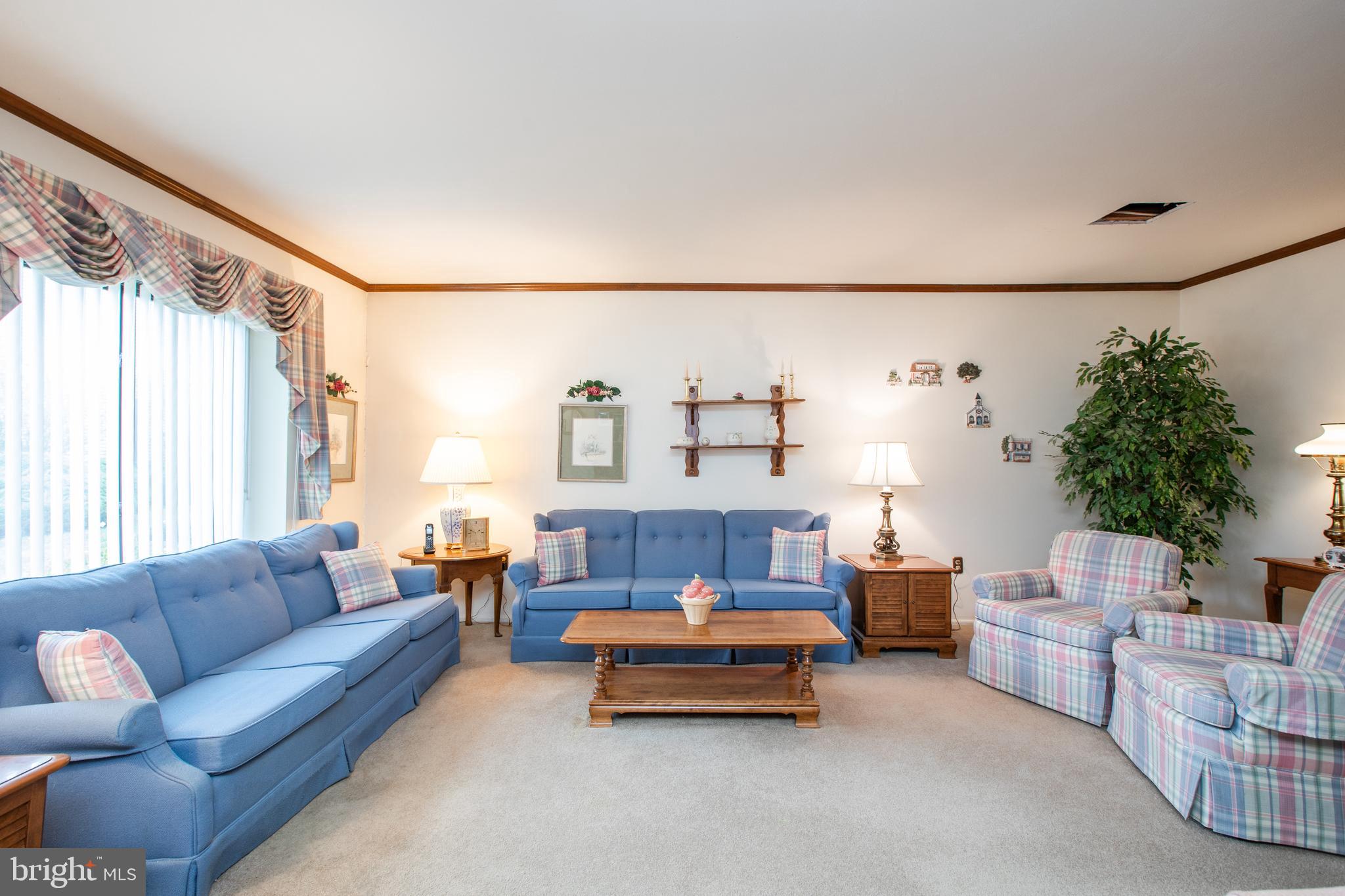 34 Kelly Court Hamilton, NJ 08690 - Photo 3 of 31 a living room with furniture and a large window