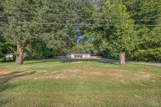 $499,000 | 6500 Chumuckla Highway, Pace, FL 32571