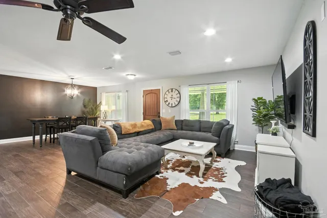 a kitchen with sink refrigerator and cabinets