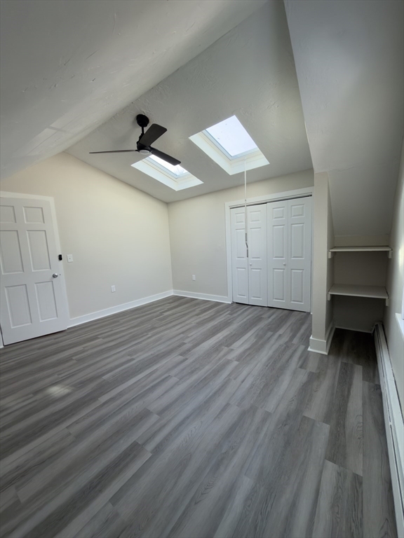 41 Sherman Street, Unit 2 Foxboro, MA 02035 - Photo 15 of 21 a view of empty room with wooden floor