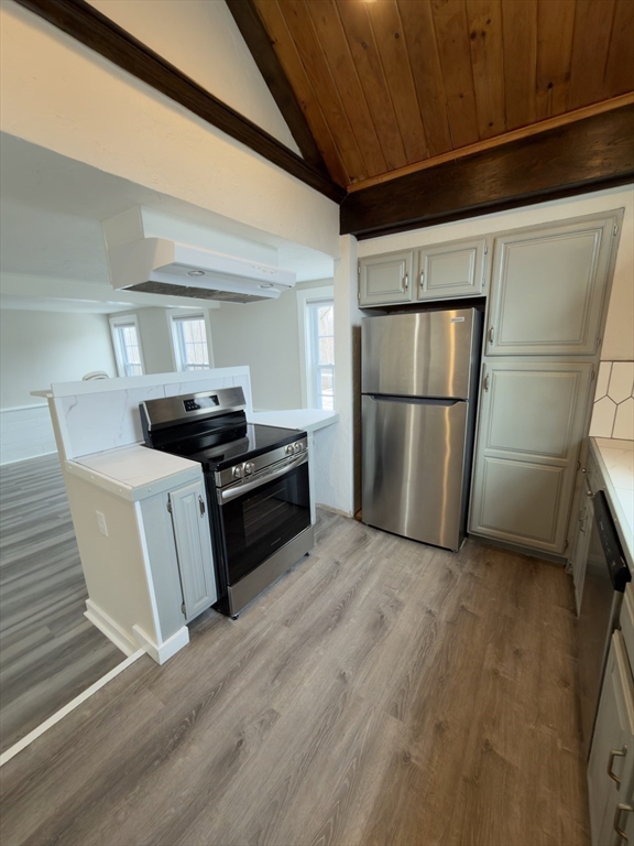 41 Sherman Street, Unit 2 Foxboro, MA 02035 - Photo 4 of 21 a kitchen with a refrigerator and a stove