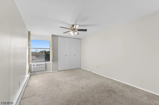 an empty room with a bathroom