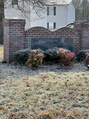 a view of a pathway with a house