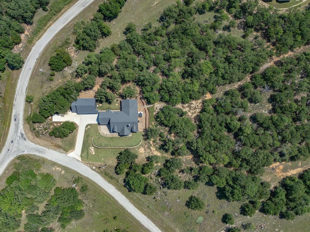 117 Ranchview Court Bowie, TX 76230 - Photo 38 of 40 an aerial view of a house with a yard