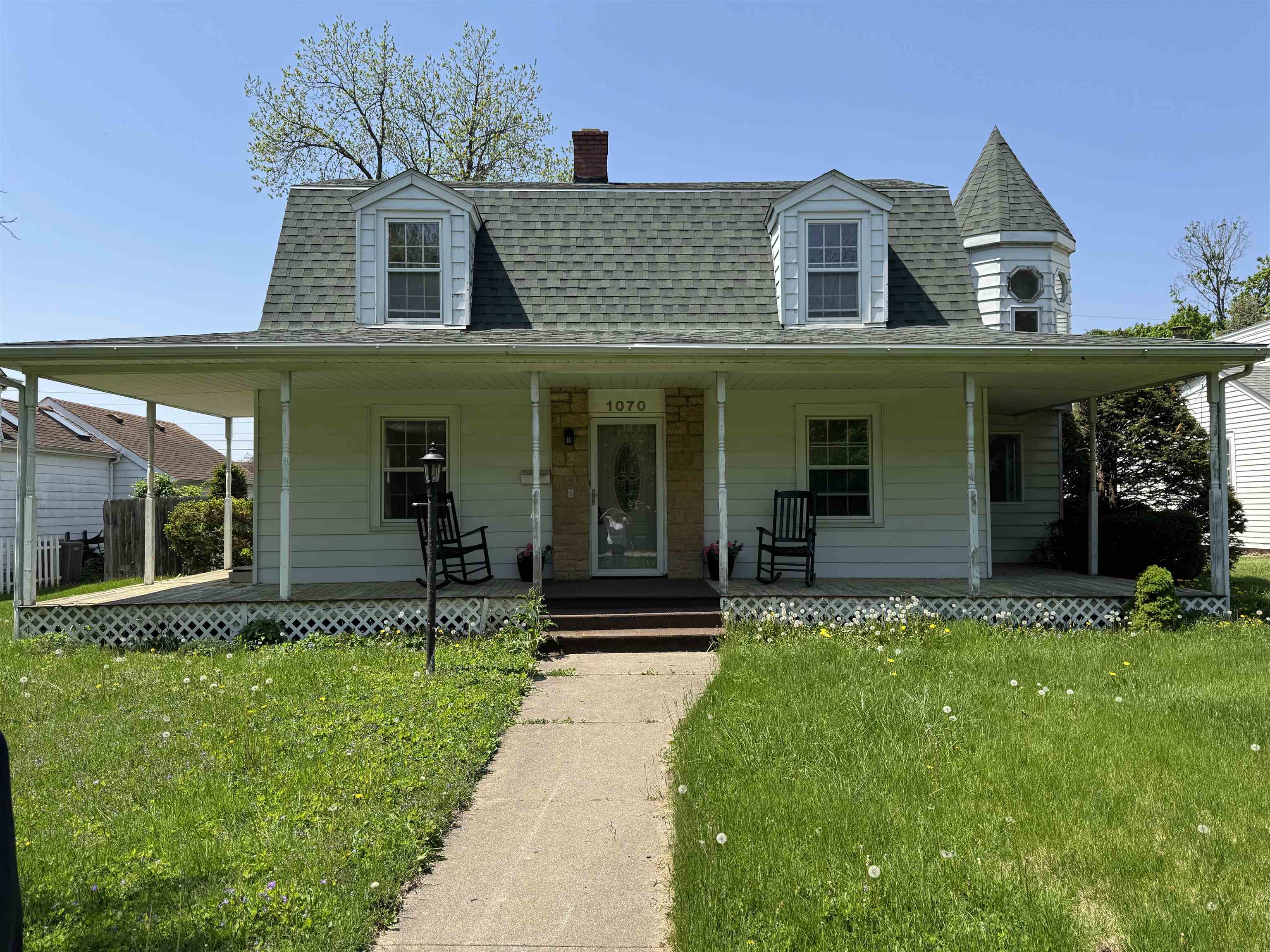 1070 North 8th Street Rochelle, IL 61068 - Photo 1 of 66 a front view of a house with a yard