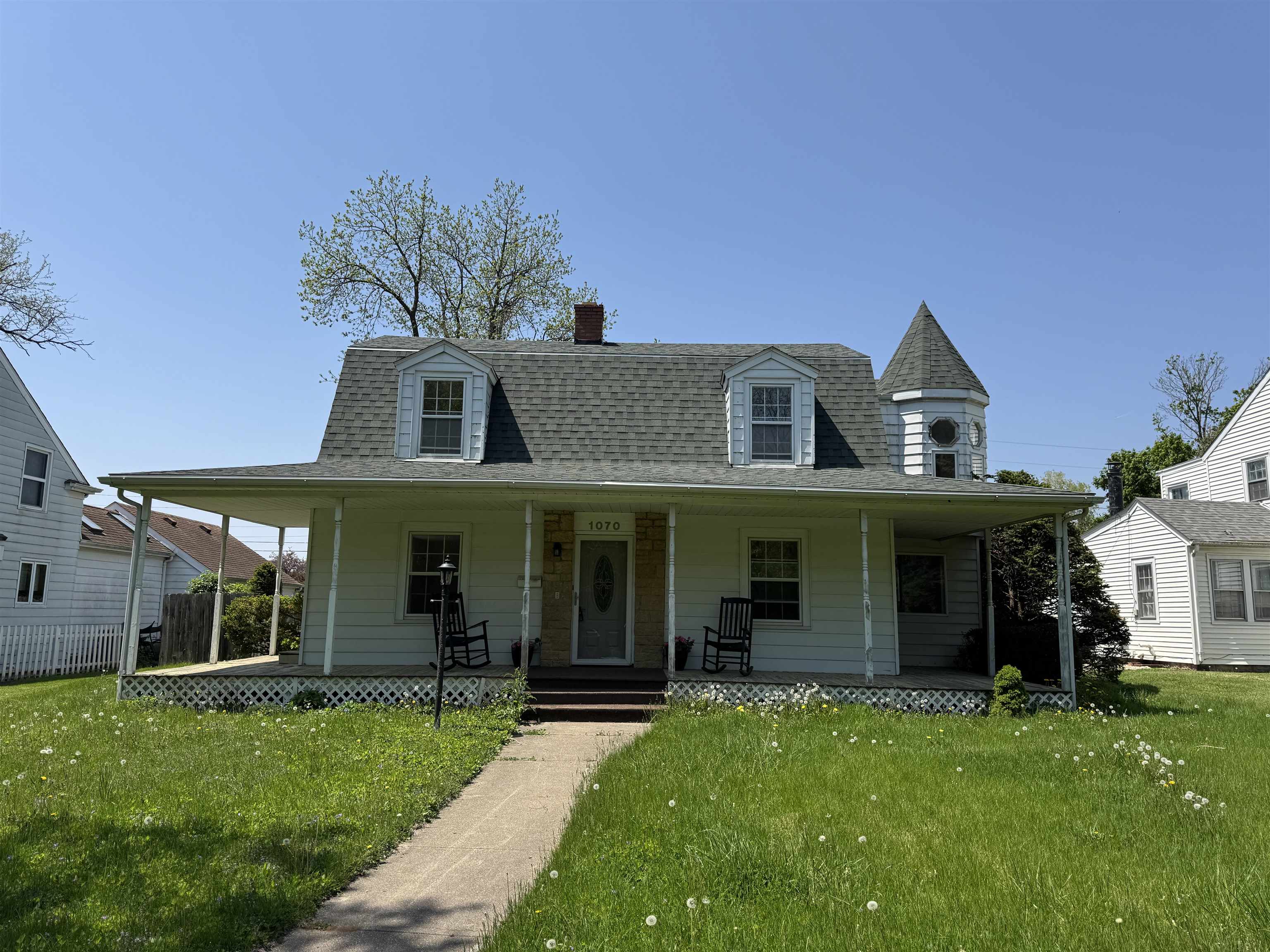 1070 North 8th Street Rochelle, IL 61068 - Photo 2 of 66 front view of a house with a yard