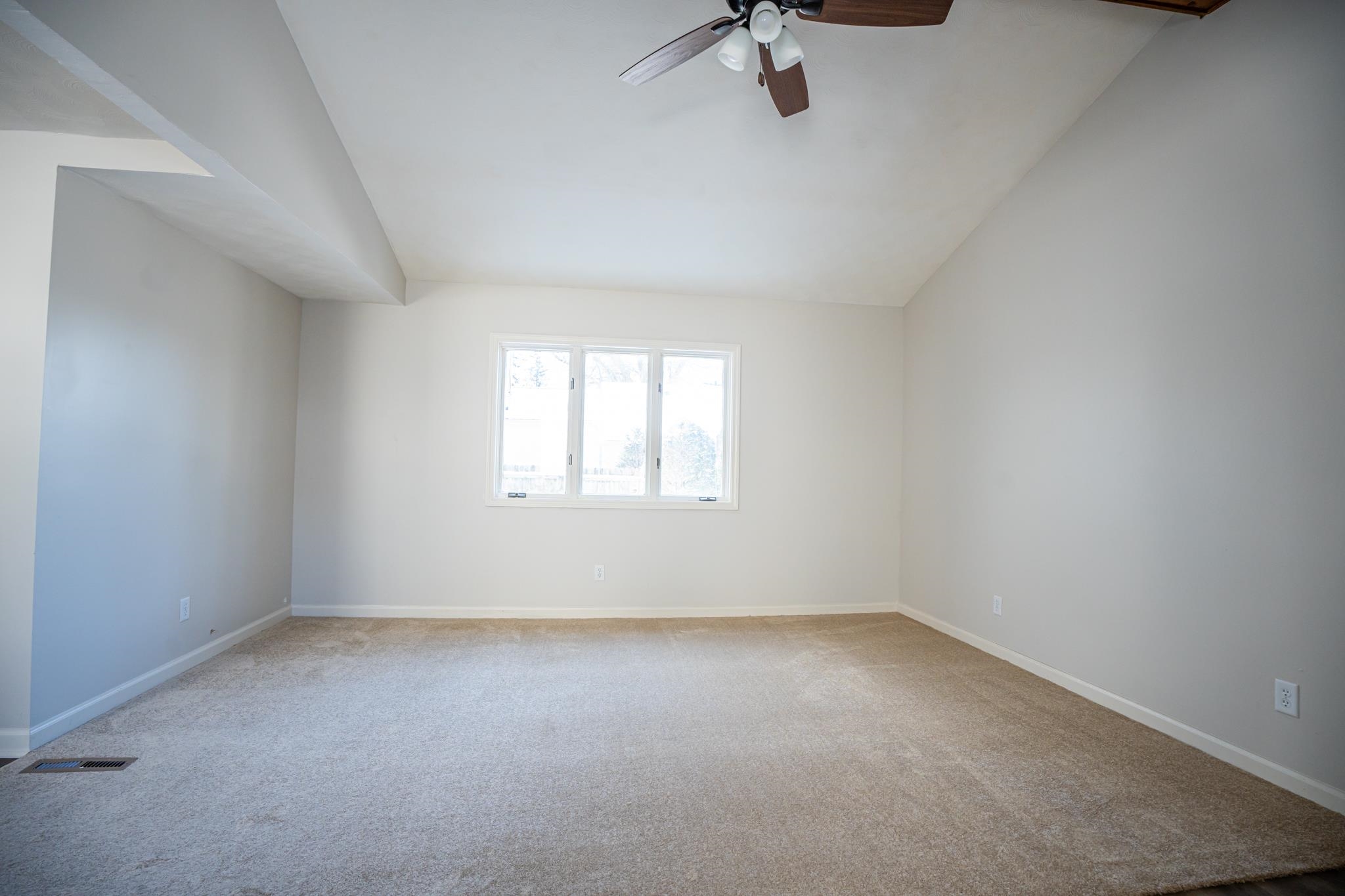 1070 North 8th Street Rochelle, IL 61068 - Photo 22 of 66 an empty room with a window