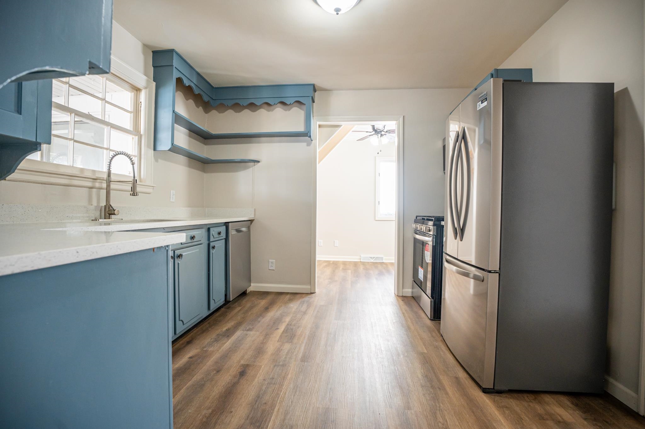 1070 North 8th Street Rochelle, IL 61068 - Photo 28 of 66 a kitchen with stainless steel appliances a refrigerator and a sink