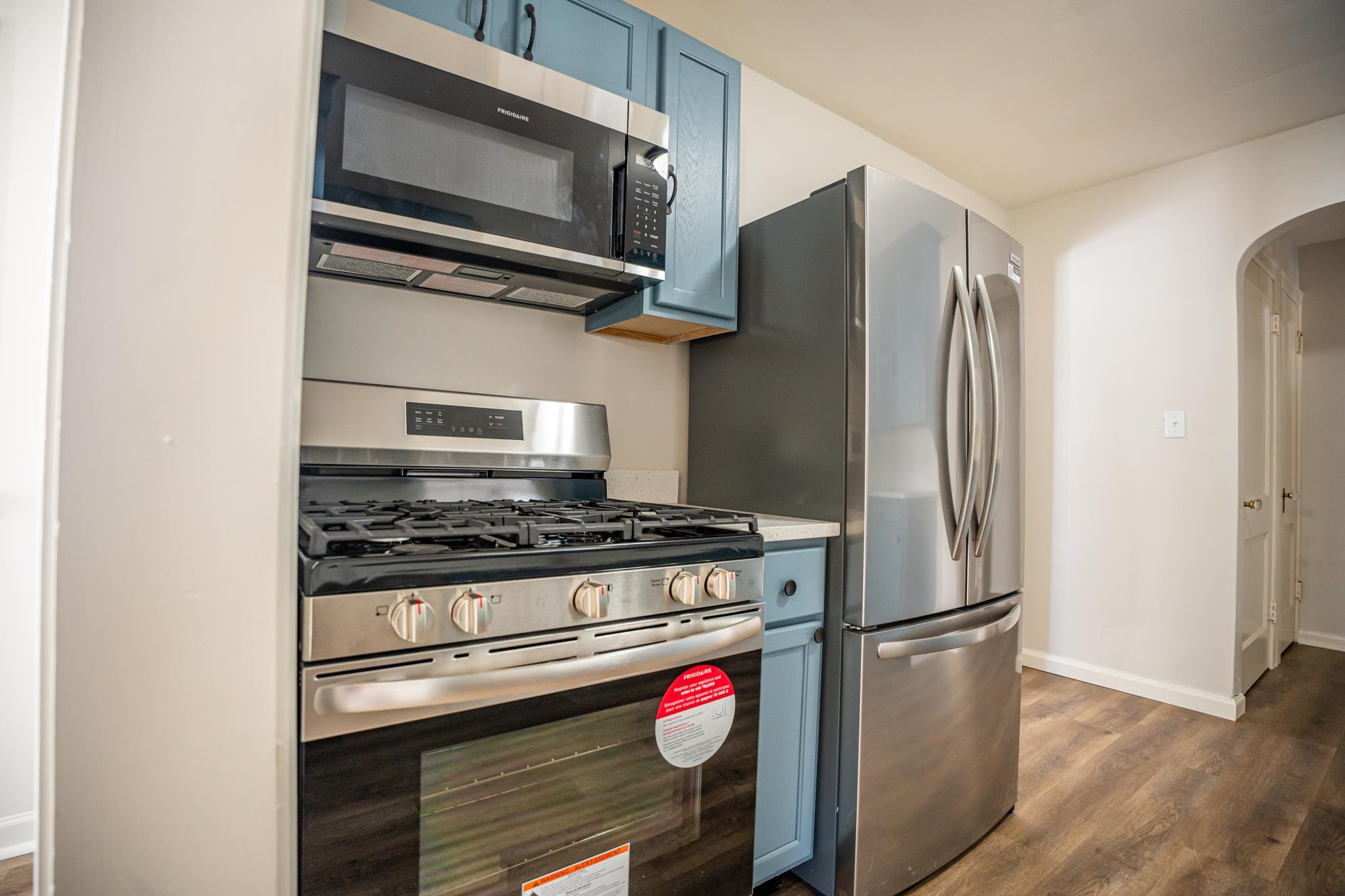 1070 North 8th Street Rochelle, IL 61068 - Photo 30 of 66 a kitchen with stainless steel appliances granite countertop a refrigerator stove and microwave
