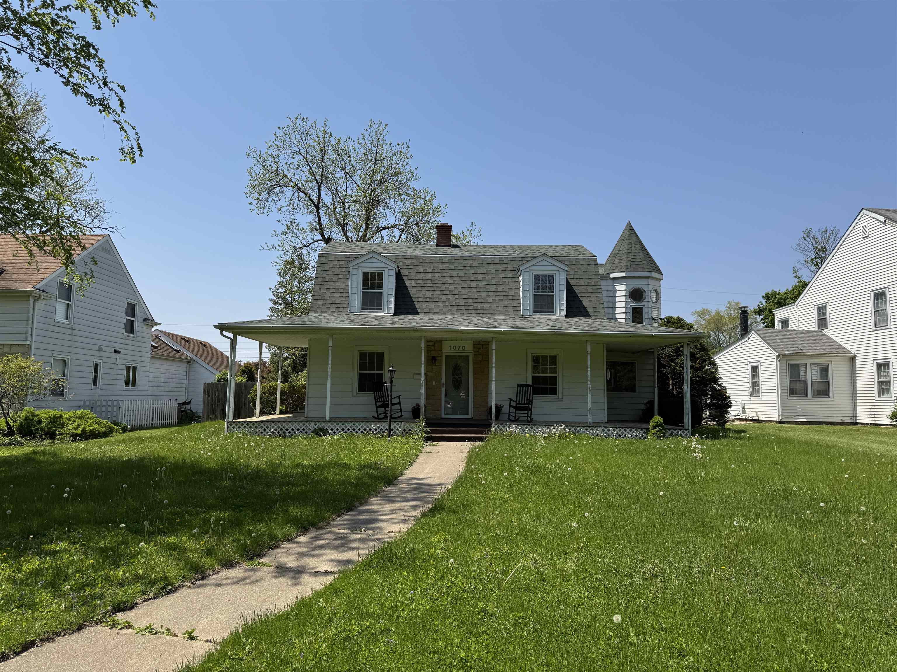 1070 North 8th Street Rochelle, IL 61068 - Photo 3 of 66 a front view of a house with a yard