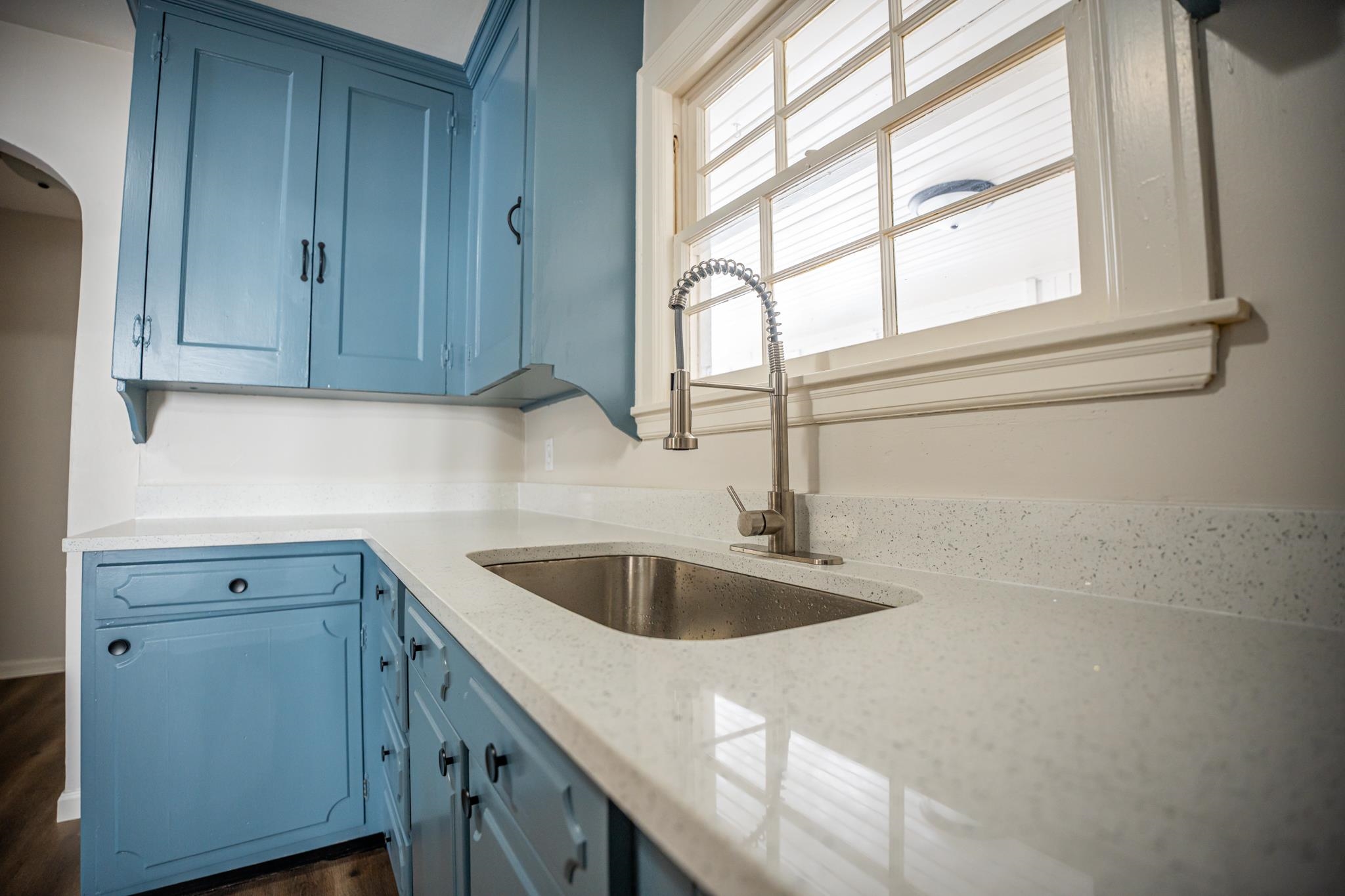 1070 North 8th Street Rochelle, IL 61068 - Photo 31 of 66 a kitchen with a sink cabinets and window