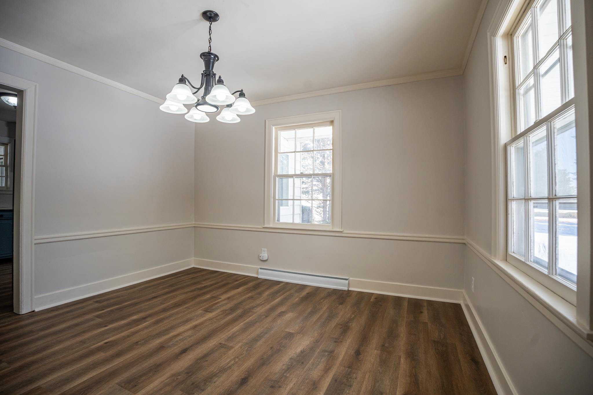1070 North 8th Street Rochelle, IL 61068 - Photo 36 of 66 a view of a room with wooden floor and windows