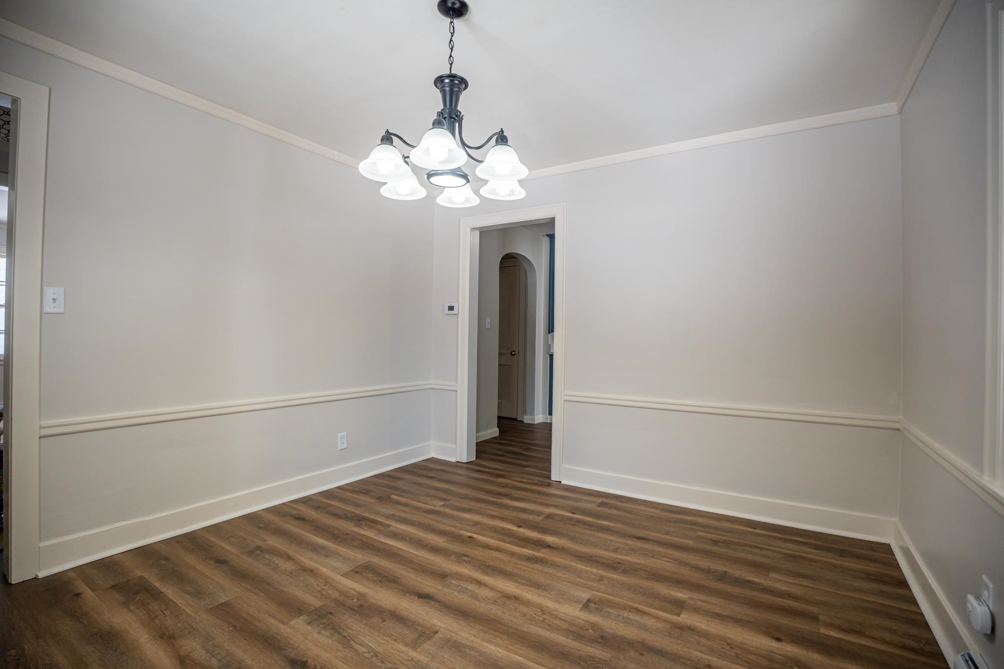 1070 North 8th Street Rochelle, IL 61068 - Photo 37 of 66 a view of a room with wooden floor and ceiling fan