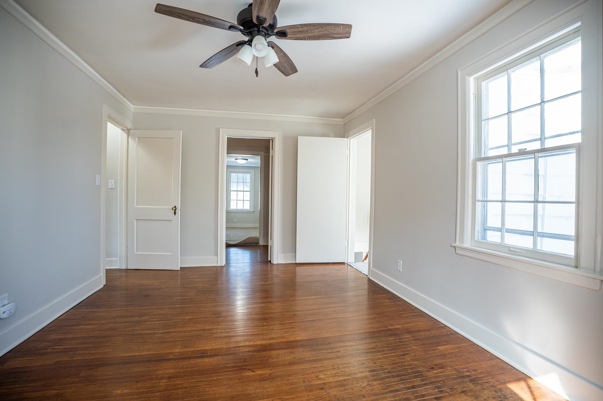 1070 North 8th Street Rochelle, IL 61068 - Photo 43 of 66 wooden floor in an empty room with a window