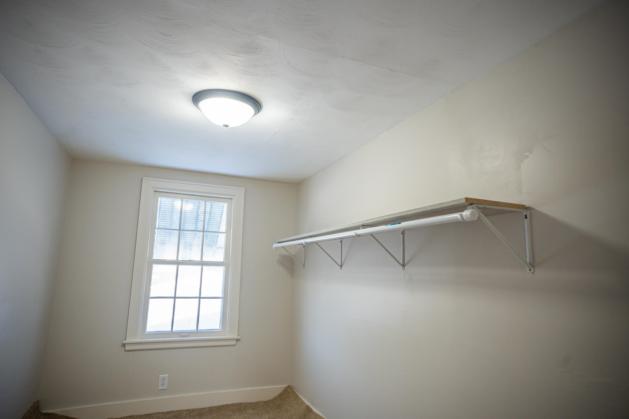 1070 North 8th Street Rochelle, IL 61068 - Photo 44 of 66 wooden floor in an empty room with a window