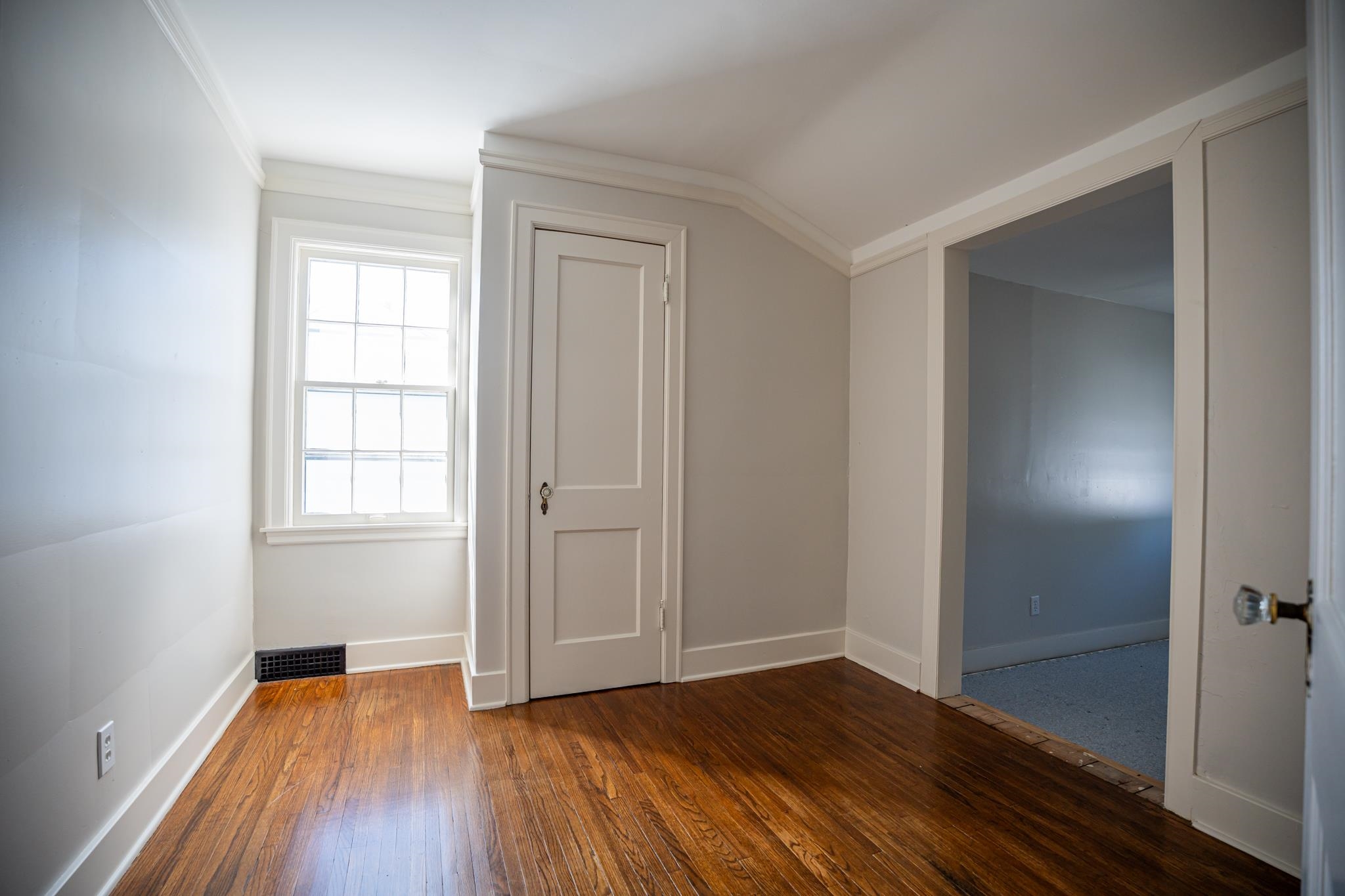 1070 North 8th Street Rochelle, IL 61068 - Photo 47 of 66 an empty room with wooden floor and closet