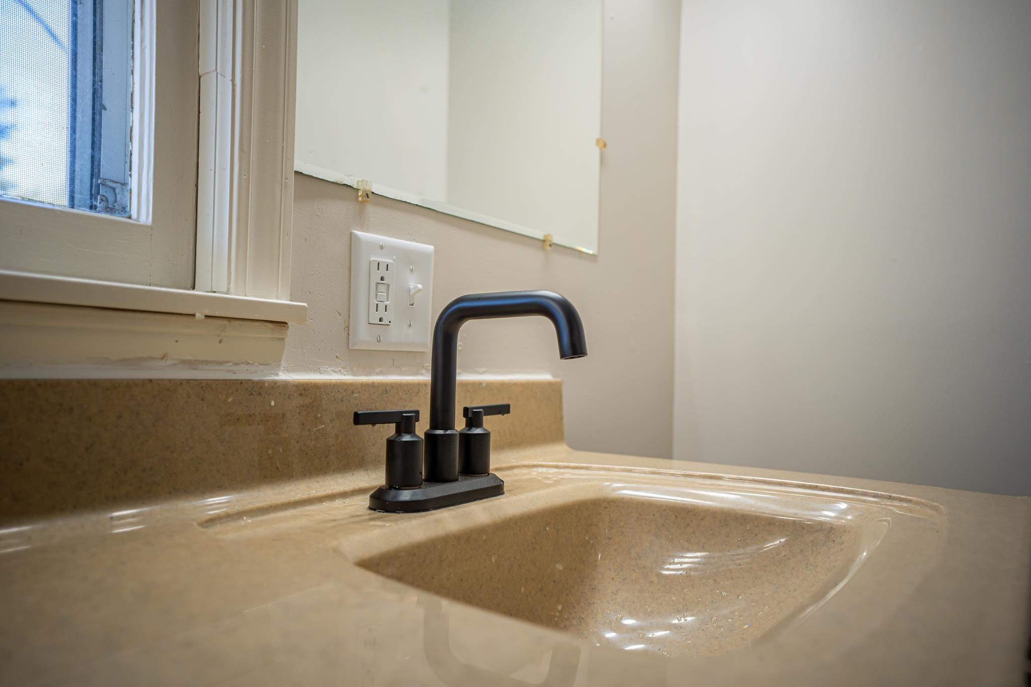 1070 North 8th Street Rochelle, IL 61068 - Photo 52 of 66 a close view of a sink and a faucet in the kitchen
