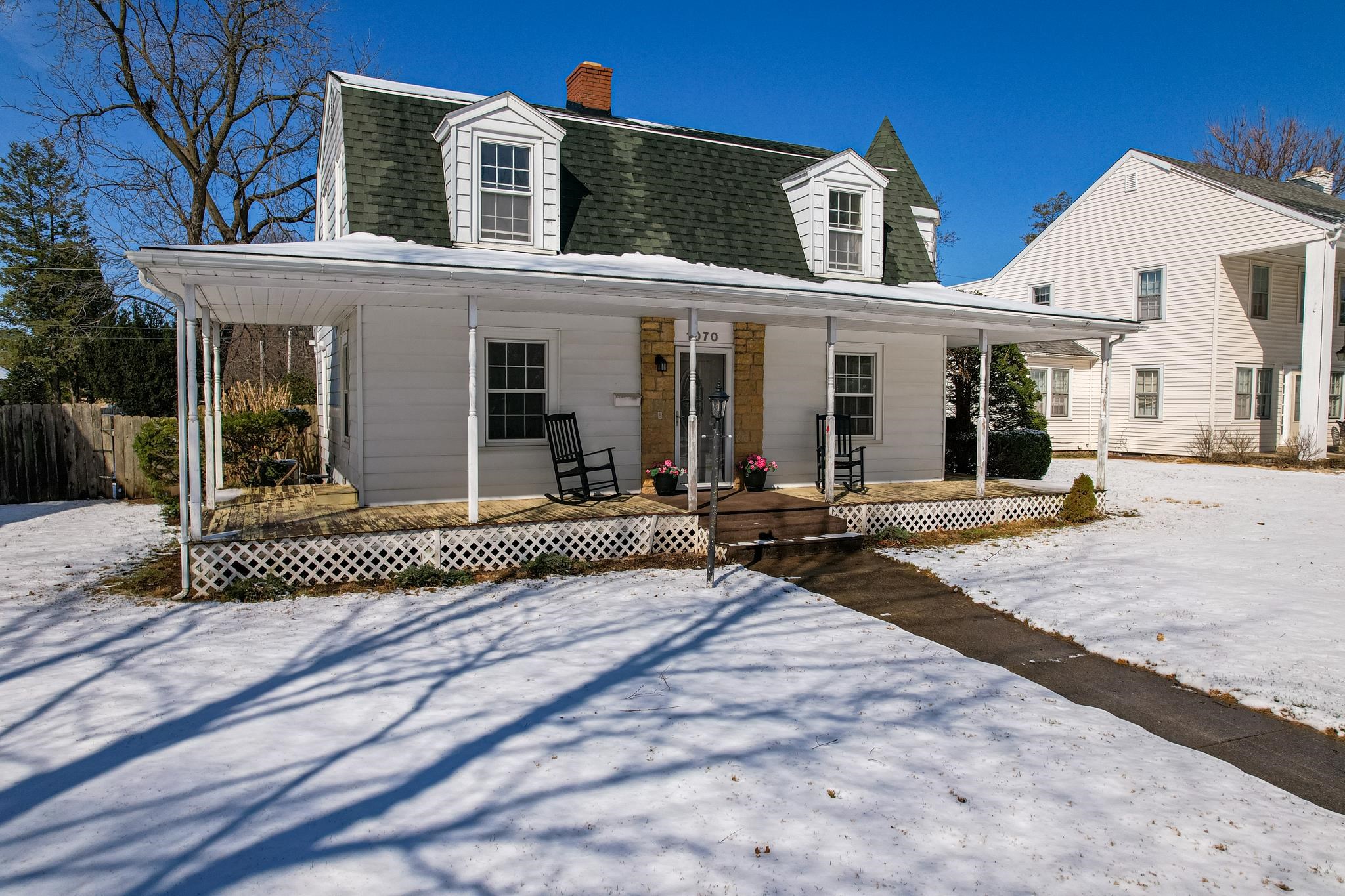 1070 North 8th Street Rochelle, IL 61068 - Photo 9 of 66 a front view of a house with a garden