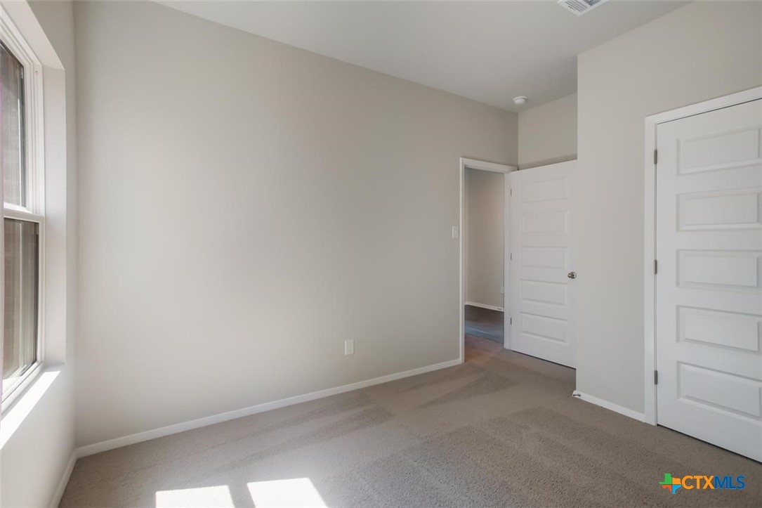 2428 Ambling Trail Georgetown, TX 78628 - Photo 22 of 33 a view of an empty room