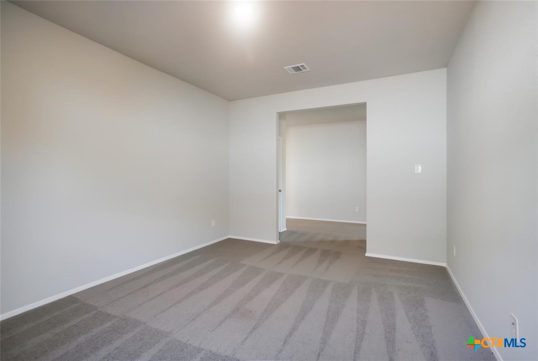 2428 Ambling Trail Georgetown, TX 78628 - Photo 24 of 33 a view of an empty room