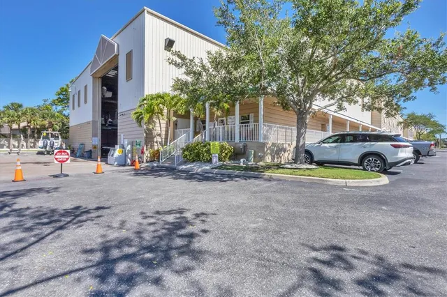 a view of street with parked cars
