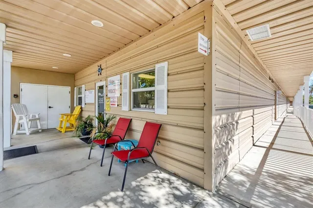 a outdoor space with patio the couches and a dining table with chairs