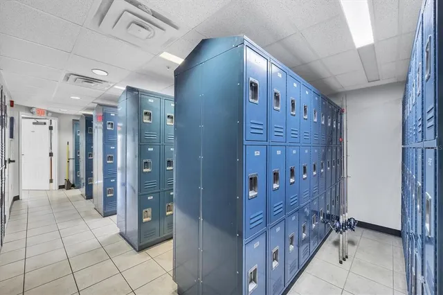 a view of a hallway with a room