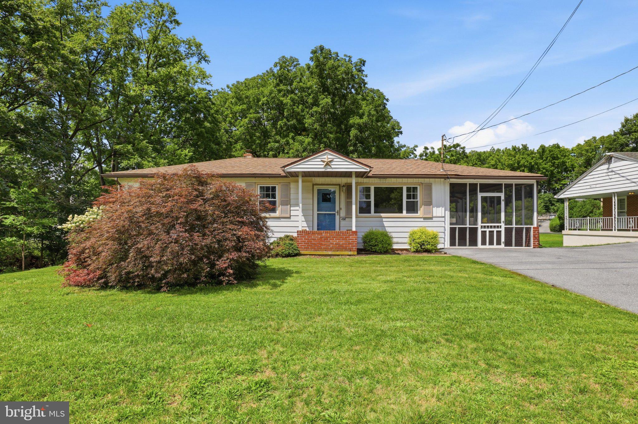 498 Middletown Road Hummelstown, PA 17036 - Photo 2 of 39 Charming home with lush greenery.